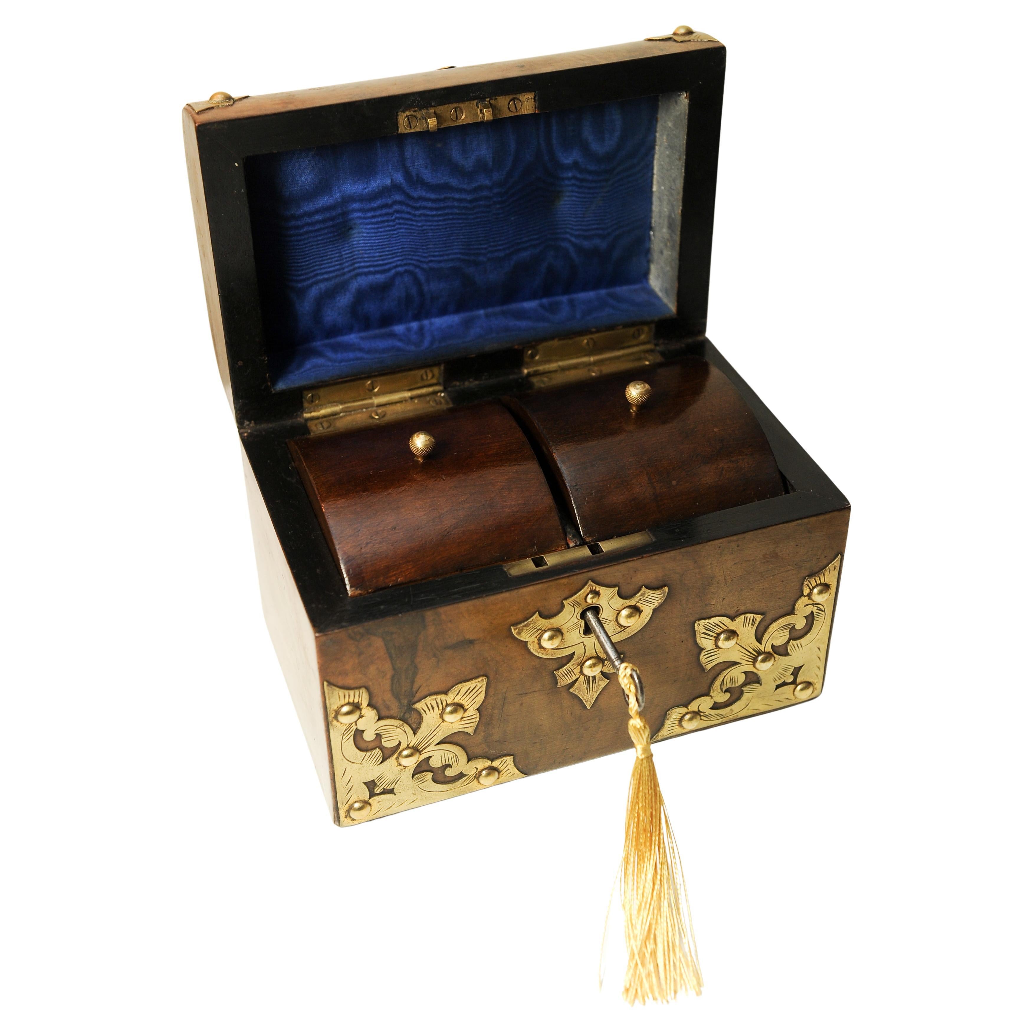 A 19th Century Victorian Decorative Brass Bound Burr Walnut Domed Tea Caddy Chest 

Features Two Caddy Compartments Which Feature Domed Wooden Lids & Each Has A Circular Brass Button Handle 

The Inside Of The Domed Lid Is Lined With A Royal Blue