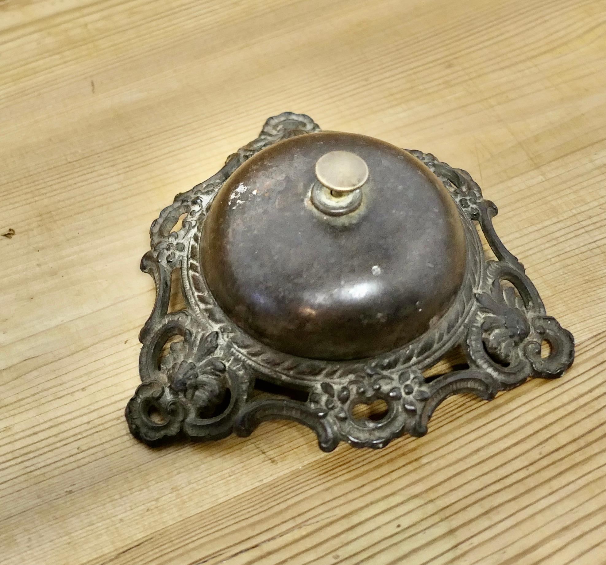 Victorian Decorative Iron Courtesy Counter Top Bell, Reception Desk Bell

Made and cast in iron, in good condition and ready to use with a demanding ding, the bell is 6” in diameter and 3” high 
VY193 