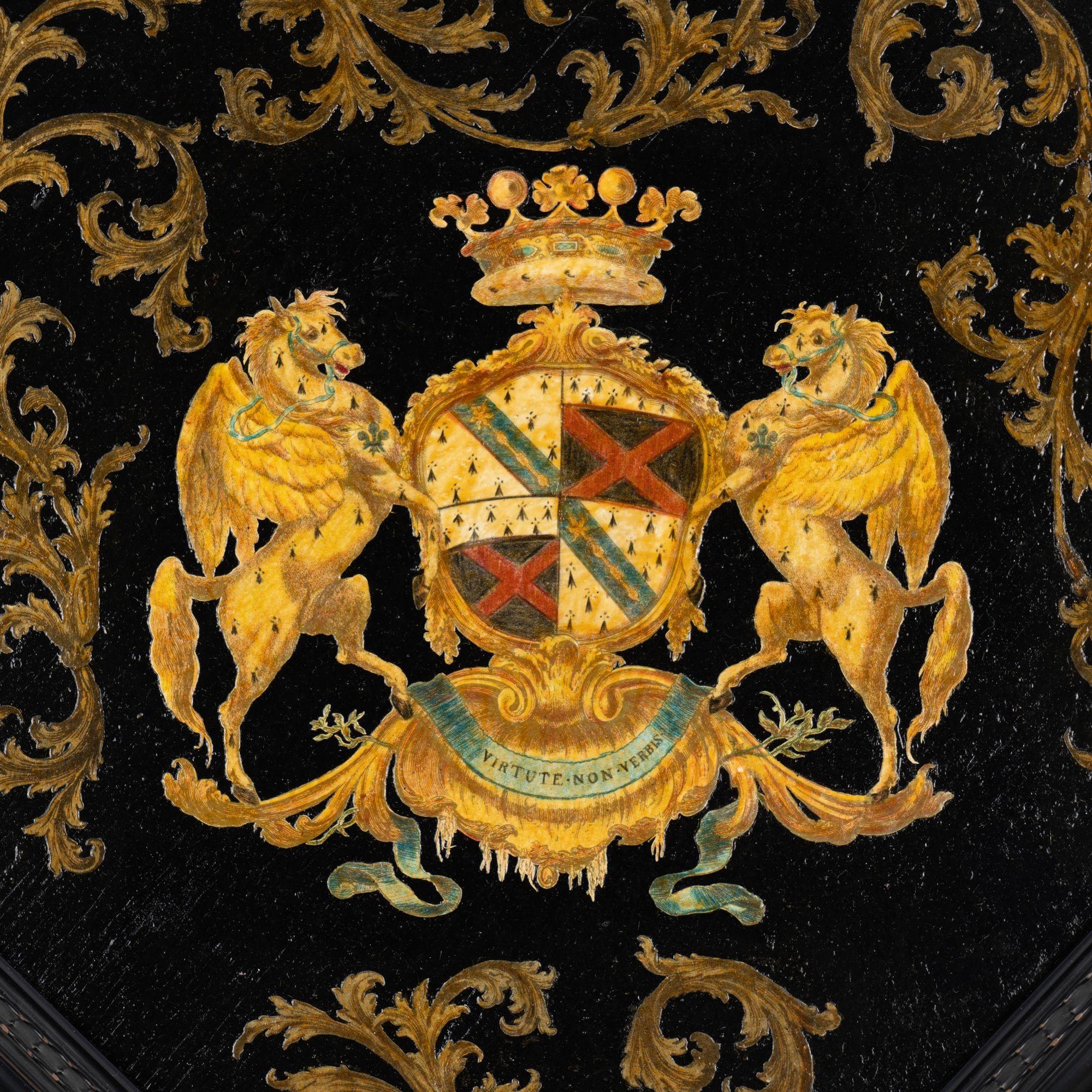 Victorian decoupage hatchment created from an early 19th century published source of armorial crests. Coat of arms with Rickford family motto “Virtute Non Verbis,