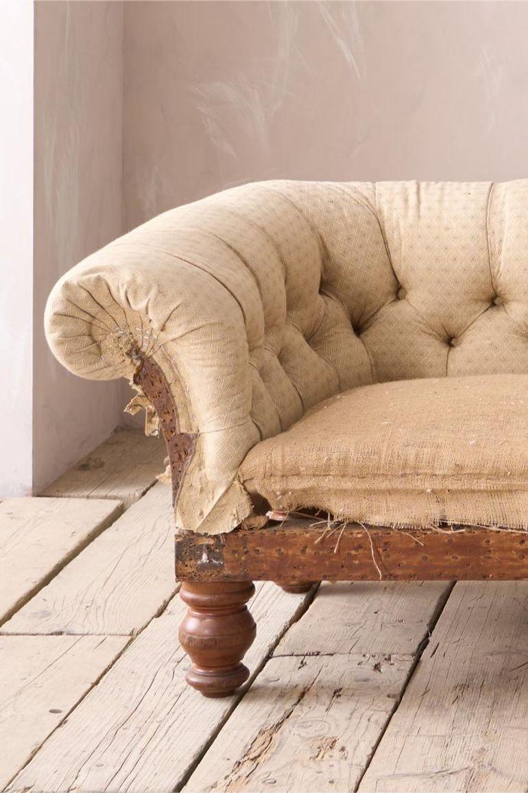 This is a superb quality late Victorian scroll arm Chesterfield sofa. Elegant design and generous size. The buttons on the back is a lovely detail as well, but we can of course upholster plain if you prefer. The 4 turned mahogany legs give this sofa