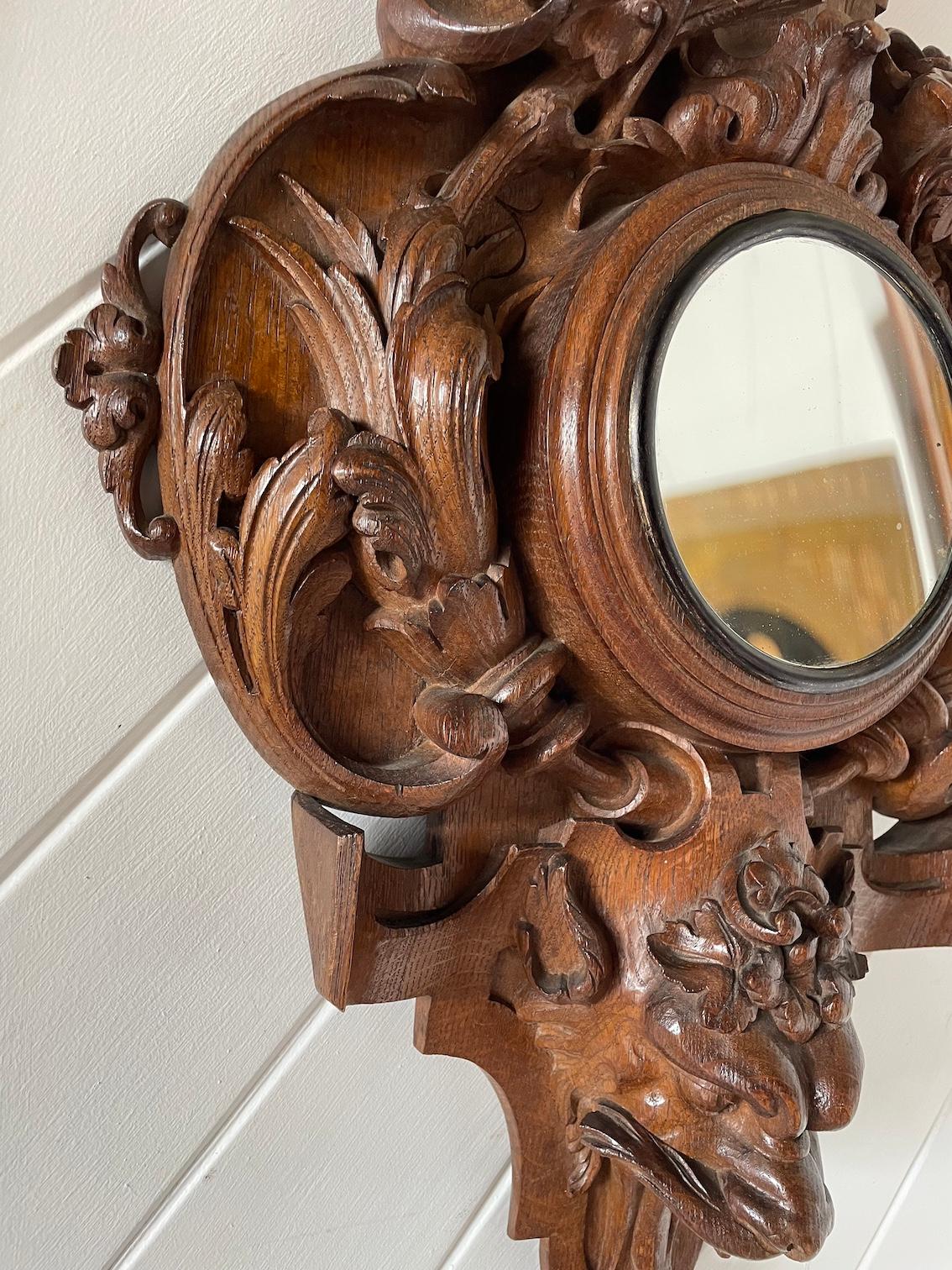 Late 19th Century Victorian Deeply Carved Oak Framed Mirror