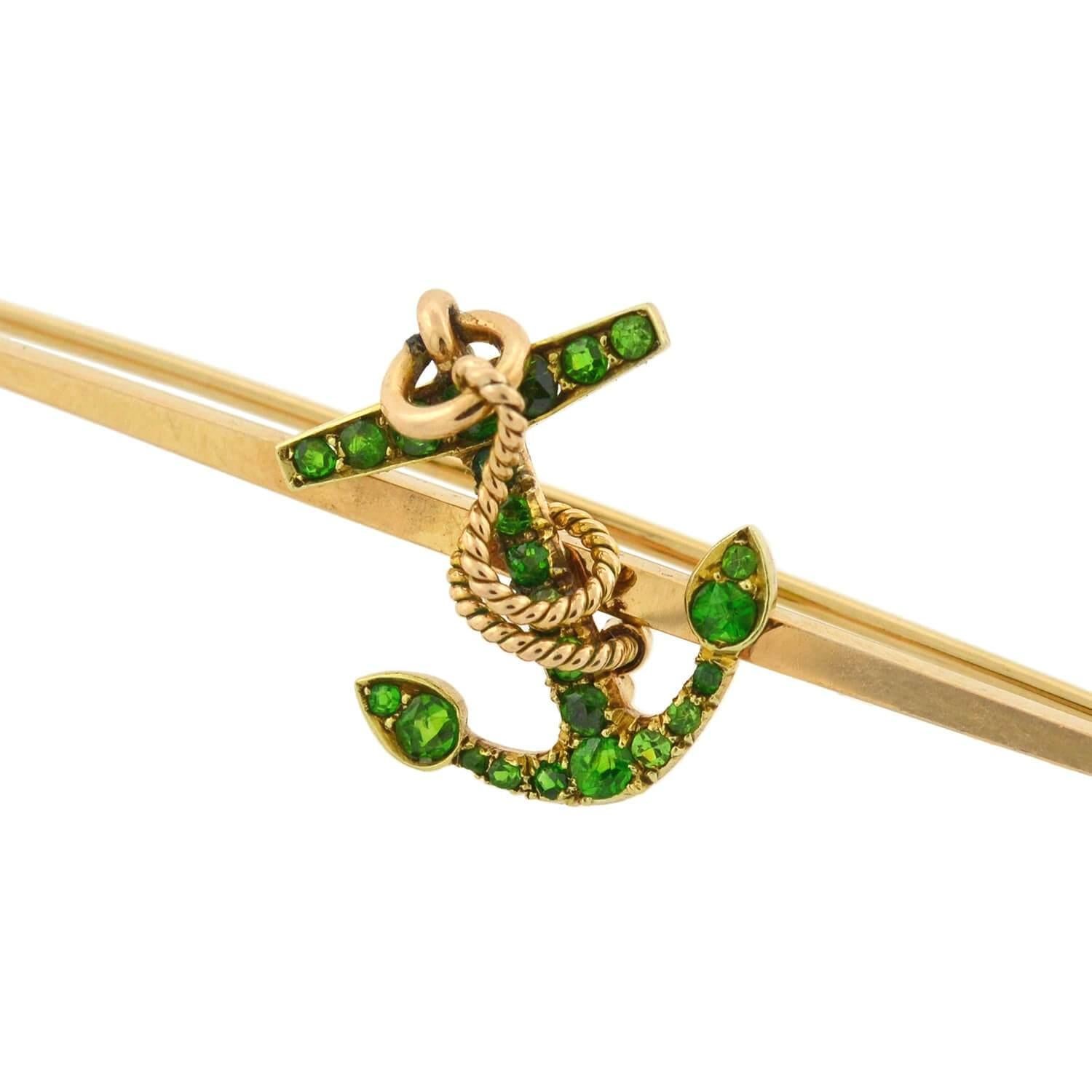 An incredible diamond anchor bar pin from the Victorian (ca1880) era! This beautiful brooch is crafted in 14kt gold, and has a stylish nautical design. Decorating the center of the gold bar is a stunning gemstone anchor, which is riveted into the