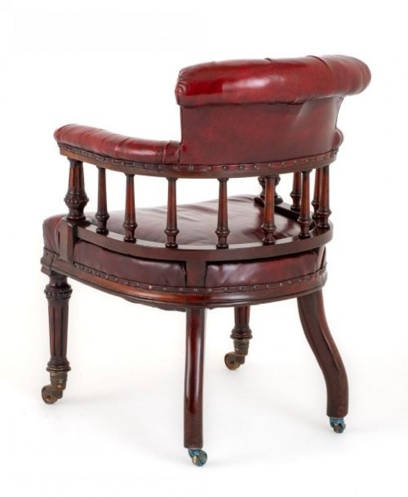 Victorian Mahogany and leather desk chair.
This quality desk chair stands upon turned and fluted front legs and swept back legs.
circa 1860
The chair features turned and fluted supports.
Upholstered in a deep red aged leather with a deep