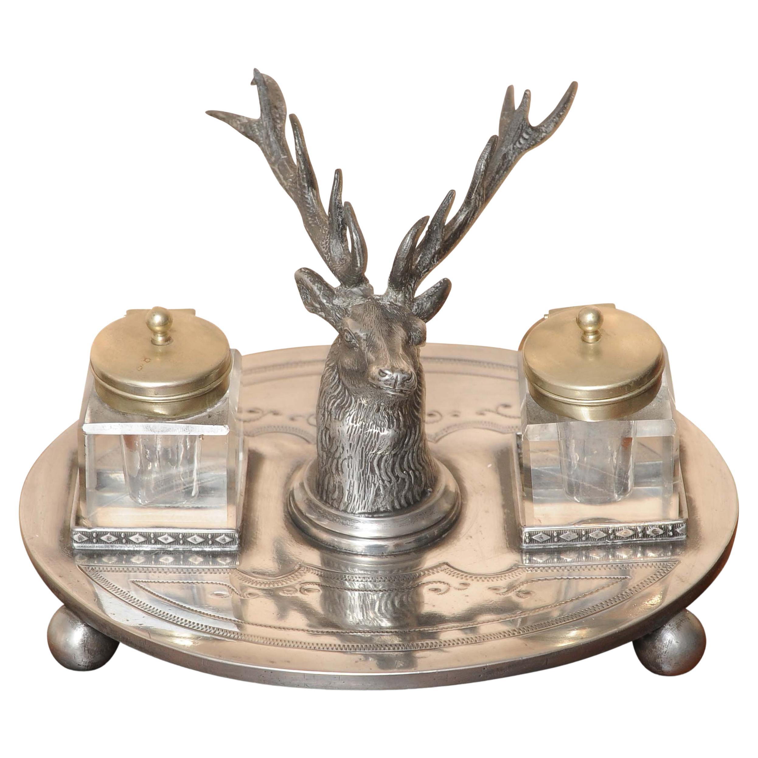 Rare Luxurious Silver Plated Stag's Head Ink Stand Desk Set Comprising of Pop Up Inkwells Art Nouveau by W W Harrison & Co Sheffield - 1800's

Befitting for any desk, Inkwells can be removed from their stands.

Stamped 5693 W W Harrison & Co