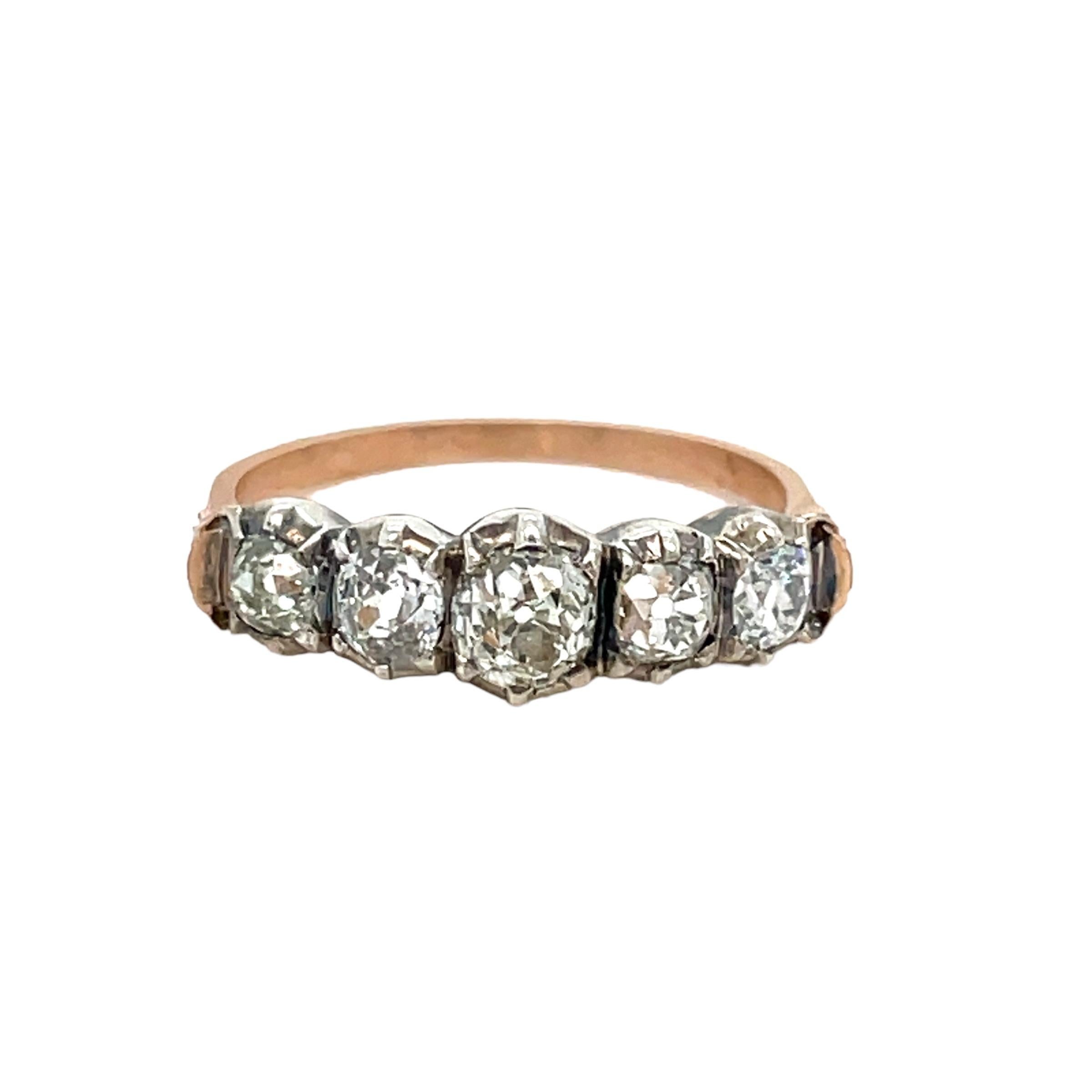  A stunning timeless diamond band ring set with five old mine cut shiny and sparkly Diamonds total 1.45 ct. estimated to be H/I in Color and VS/SI in Clarity.
The band is set in 18k rose gold and silver. Circa 1900

CONDITION: Pre-Owned -