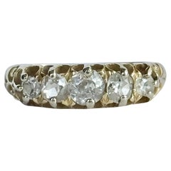 Bague victorienne à cinq pierres en or 15 carats et diamants