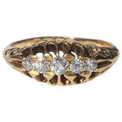 Anello vittoriano con diamante e cinque pietre in oro 18 carati