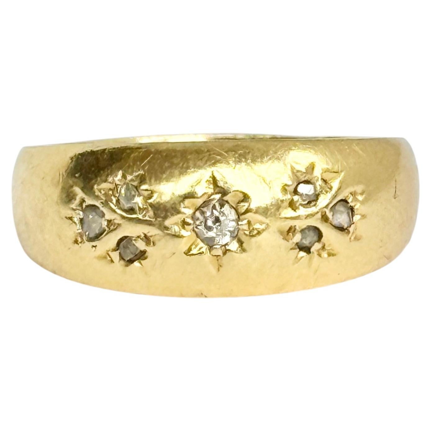 Anillo victoriano de diamantes y oro de 18 quilates con engaste de estrella