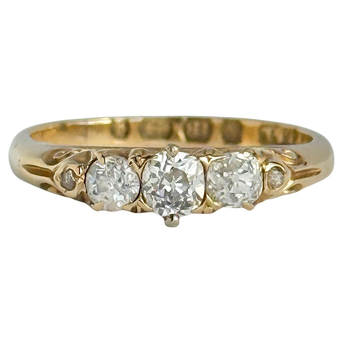 Anello vittoriano con tre pietre in oro 18 carati e diamanti