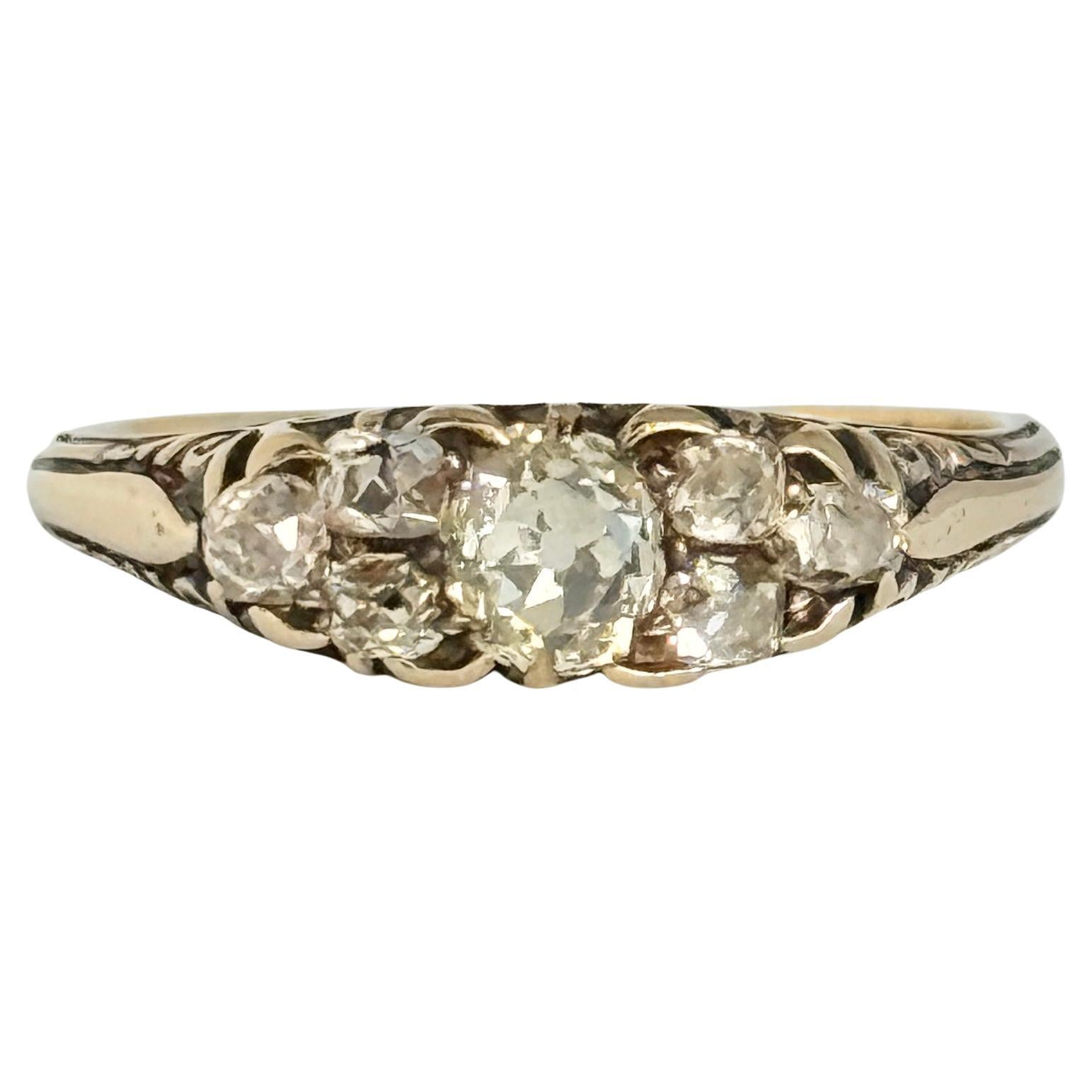 Anello vittoriano con tre pietre in oro 18 carati e diamanti