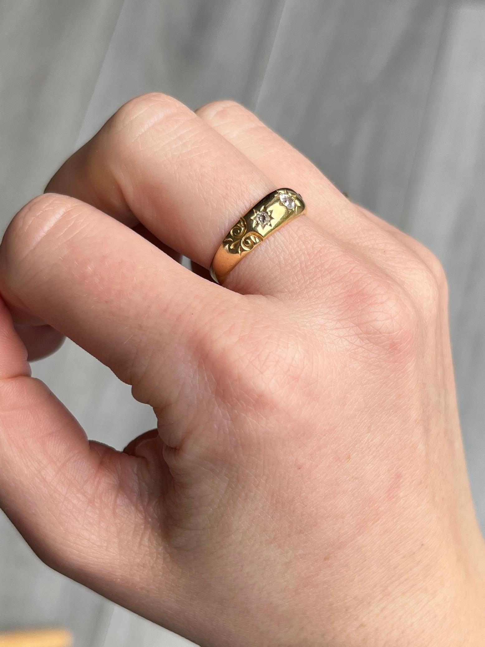 This gorgeous 18ct gold band holds three diamonds totalling 18pts. They are bright and have a lovely sparkle and are set in star settings. Fully hallmarked Birmingham 1893.

Ring Size:M 1/2 or 6 1/2
Band Width: 5.5mm 

Weight: 3.1g