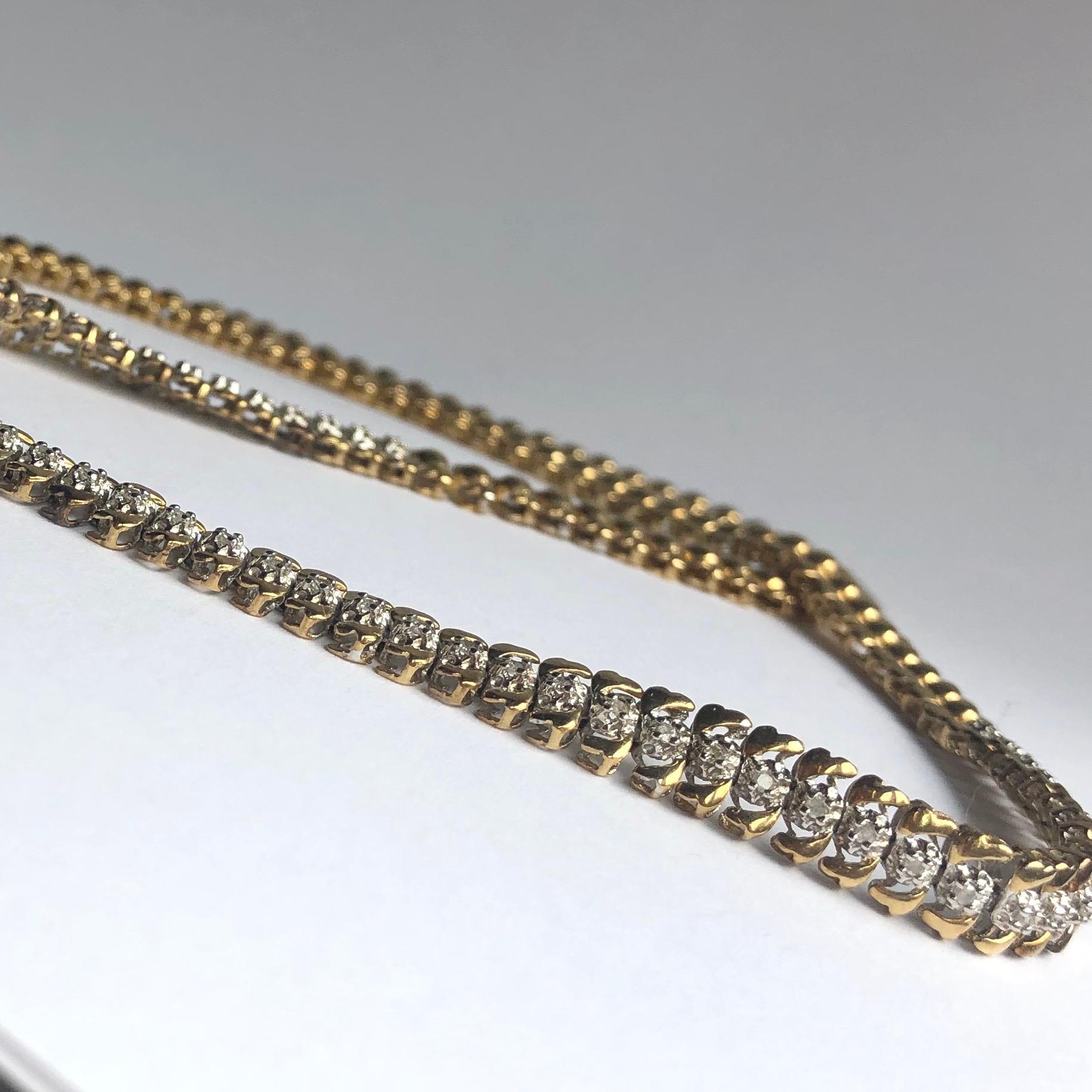 This beautiful 9ct gold collar has a central line of diamonds set in platinum. The total carat weight is 1.24carat. The chain is detailed and looks great even worn alone! It is fastened using an invisible clasp so the chain just keeps going round