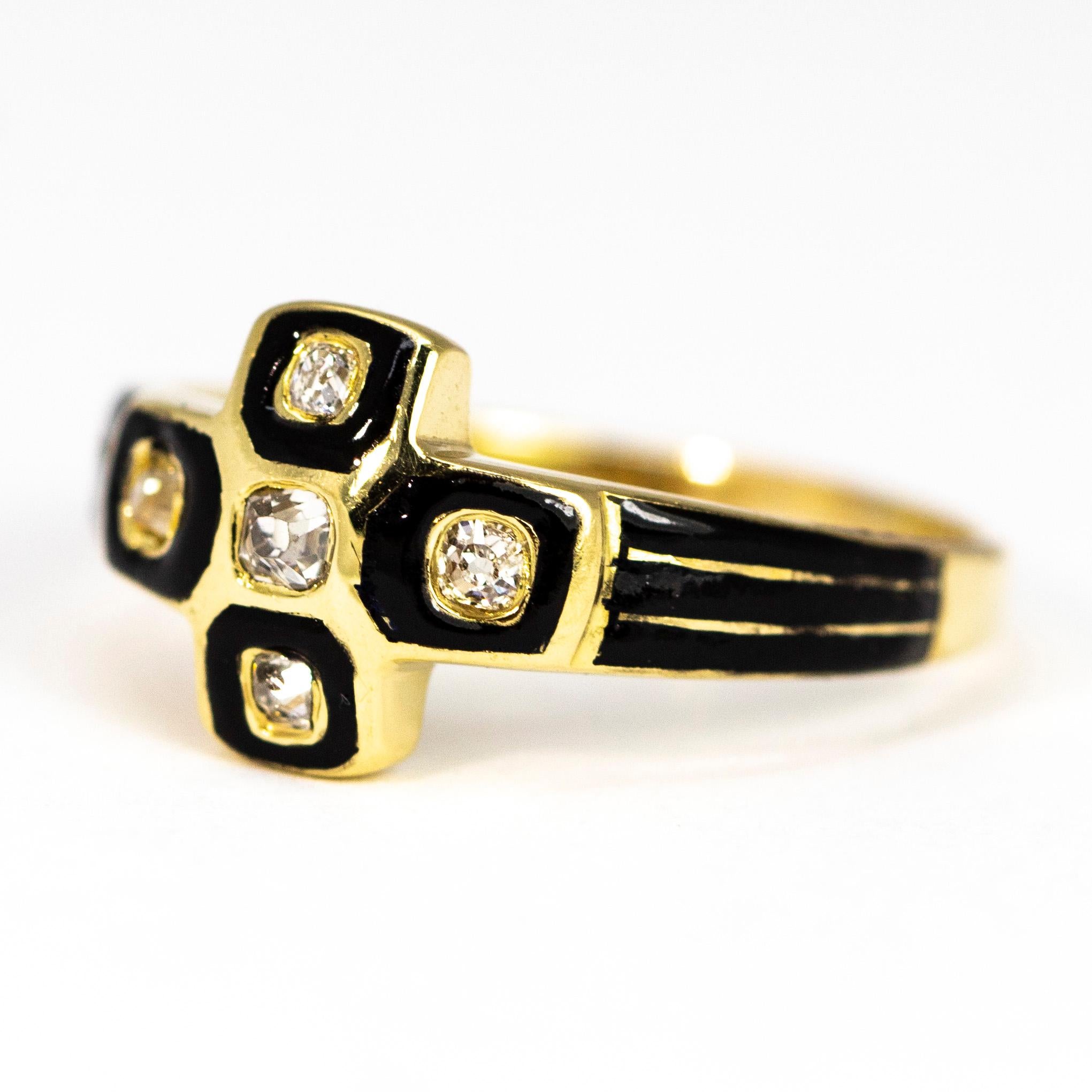 This ring holds five old mine cut diamonds, the central diamond measures 7pts and the four surrounding it measure 3pts each. The gorgeous black enamel is glossy and surround the diamonds and is used on the shoulders of the ring. Modelled in 18ct