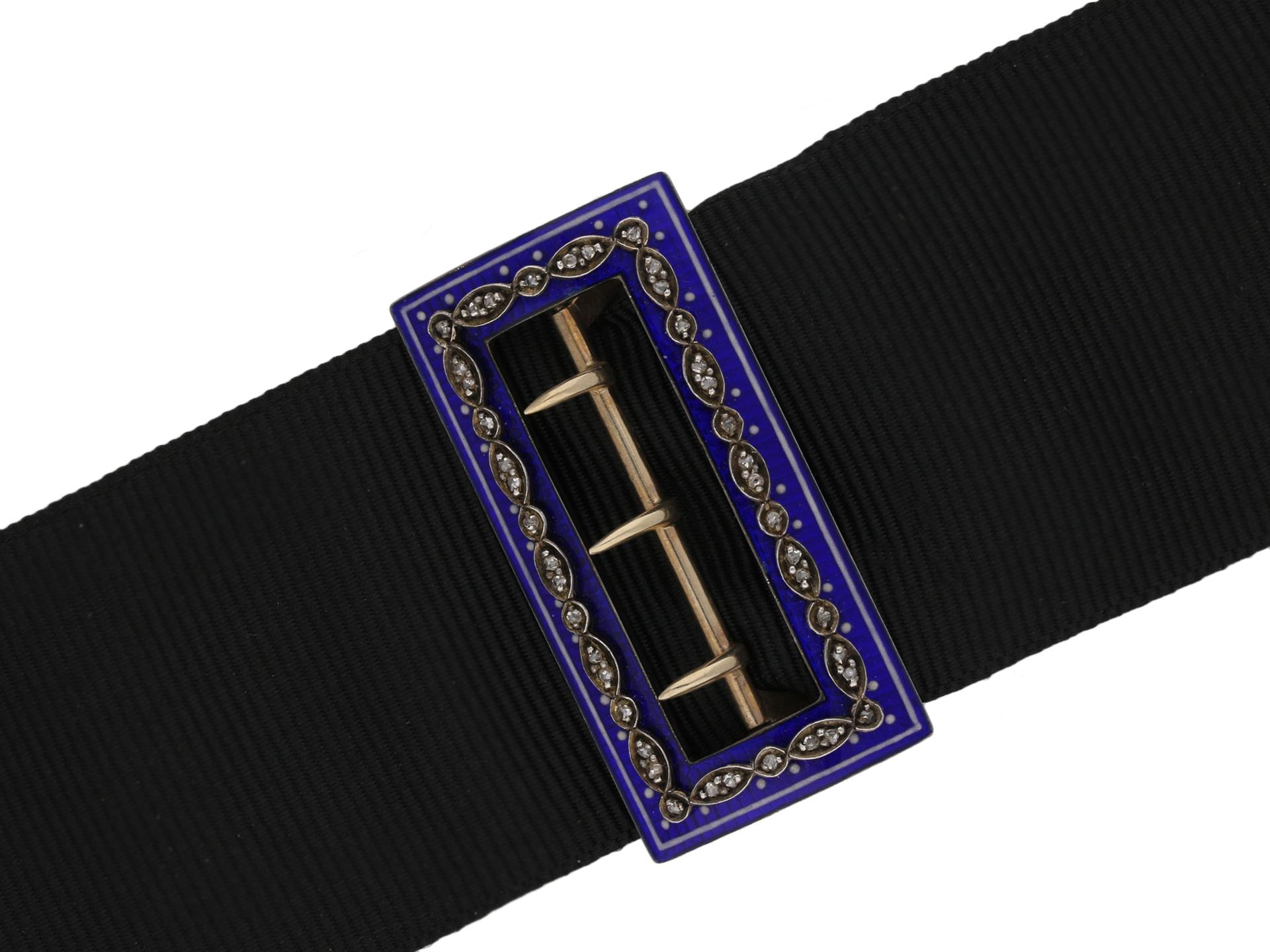 Victorian diamond and enamel sash buckle. Vibrant blue baisse taille enamelled border set with forty two rose cut diamonds in closed back grain settings with an approximate combined weight of 0.42 carats, to a rectangular sash buckle design