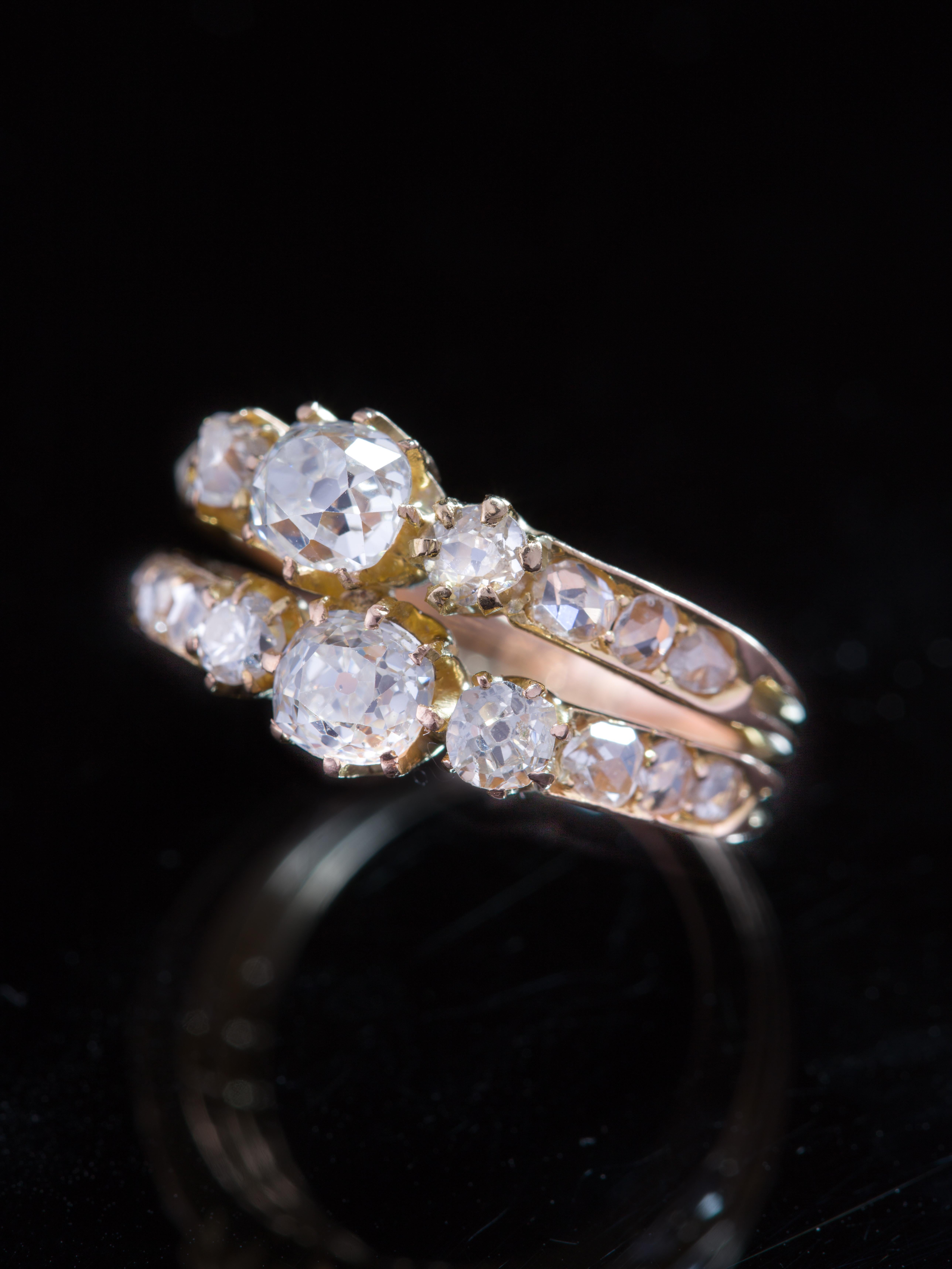 Sentimental in nature, symbolizing the melding of two into one, or two souls lying along each other for eternity is this romantic diamond ring from Victorian era.  
Sensual and complex in its vision, resonating with sparks of light this Victorian