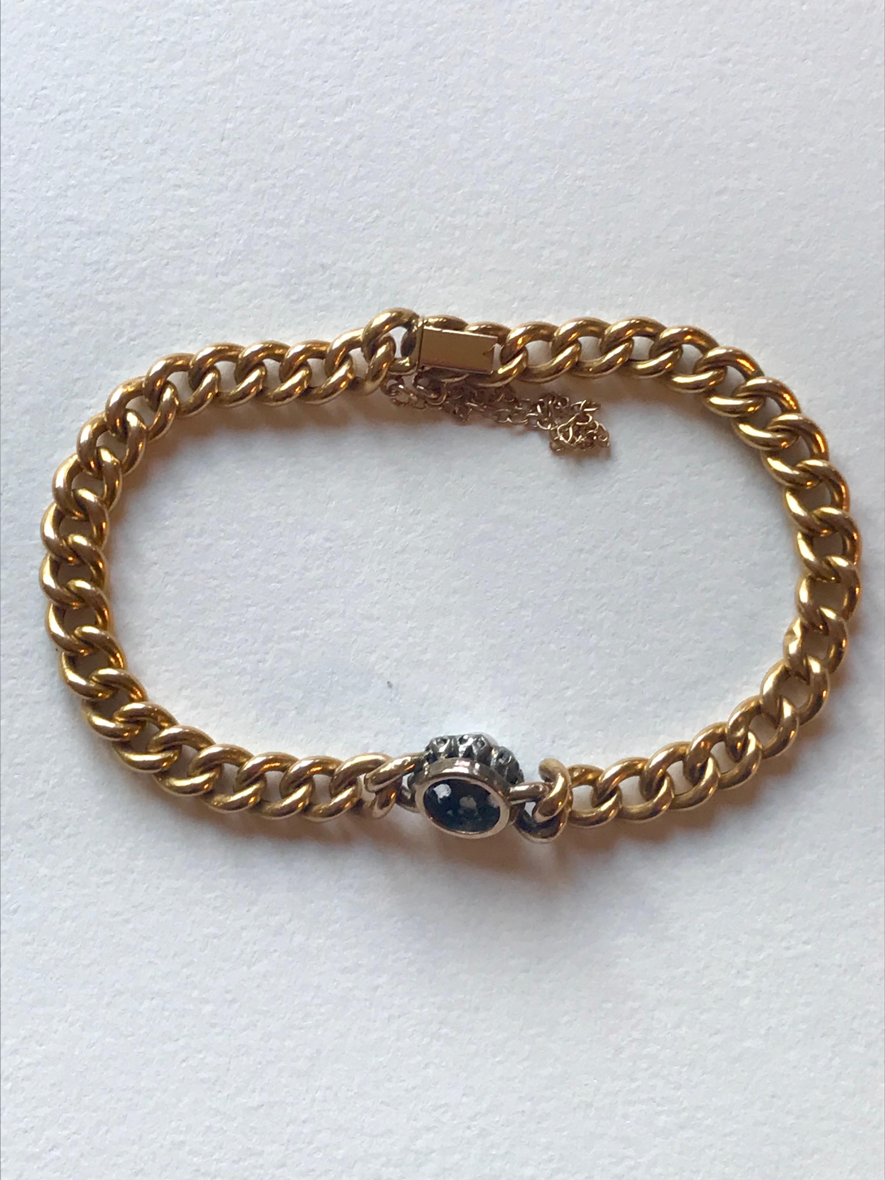 A diamond and pearl (untested) 18 karat gold bracelet set with rose cuts estimated to be 0.4cts in weight.  The Diamonds have a lot of fire (which is a technical turn meaning they refract the light well and sparkle). This is a bracelet which is in