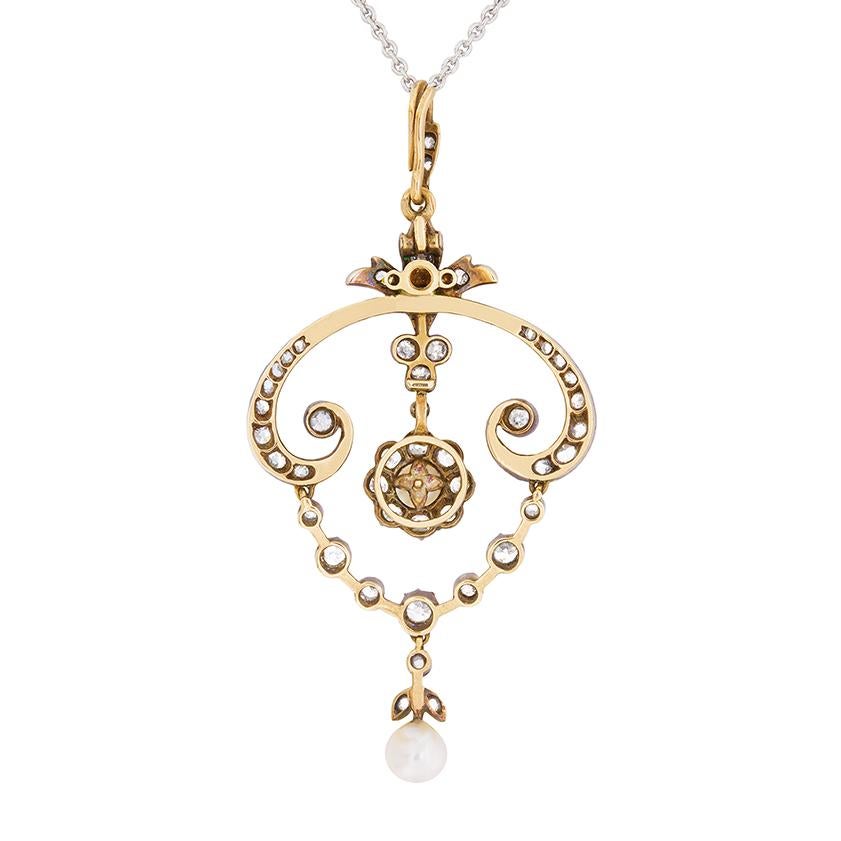 Dating to the 1880s, this beautiful necklace is made from 15 carat rose gold and silver. The diamonds are a mix of old cuts and rose cut diamonds which total to 2.00 carats. The old cut diamonds, which are hand cut, are estimated as G in colour and