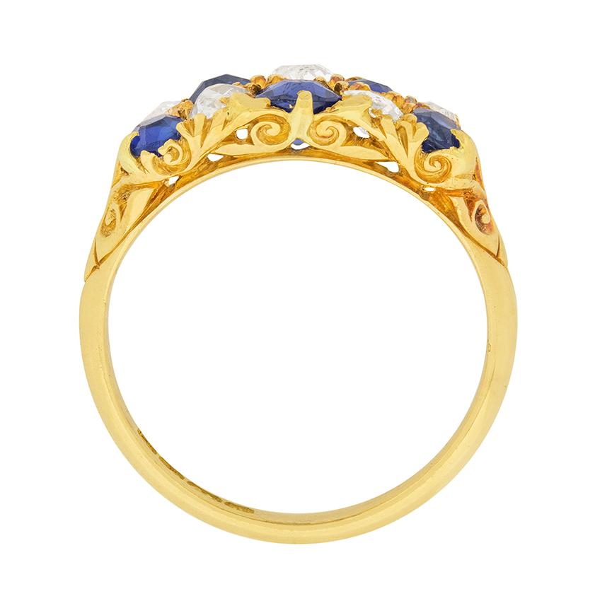 This checkered Victorian ring is a great statement piece. Five blue sapphires and five diamonds form an alternating pattern. The centre sapphire is 0.35 carat, the two lower sapphires are 0.20 carat each, and the two upper sapphires are 0.15 carat