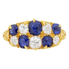 Anello vittoriano con diamanti e zaffiri a grappolo, 1894 circa