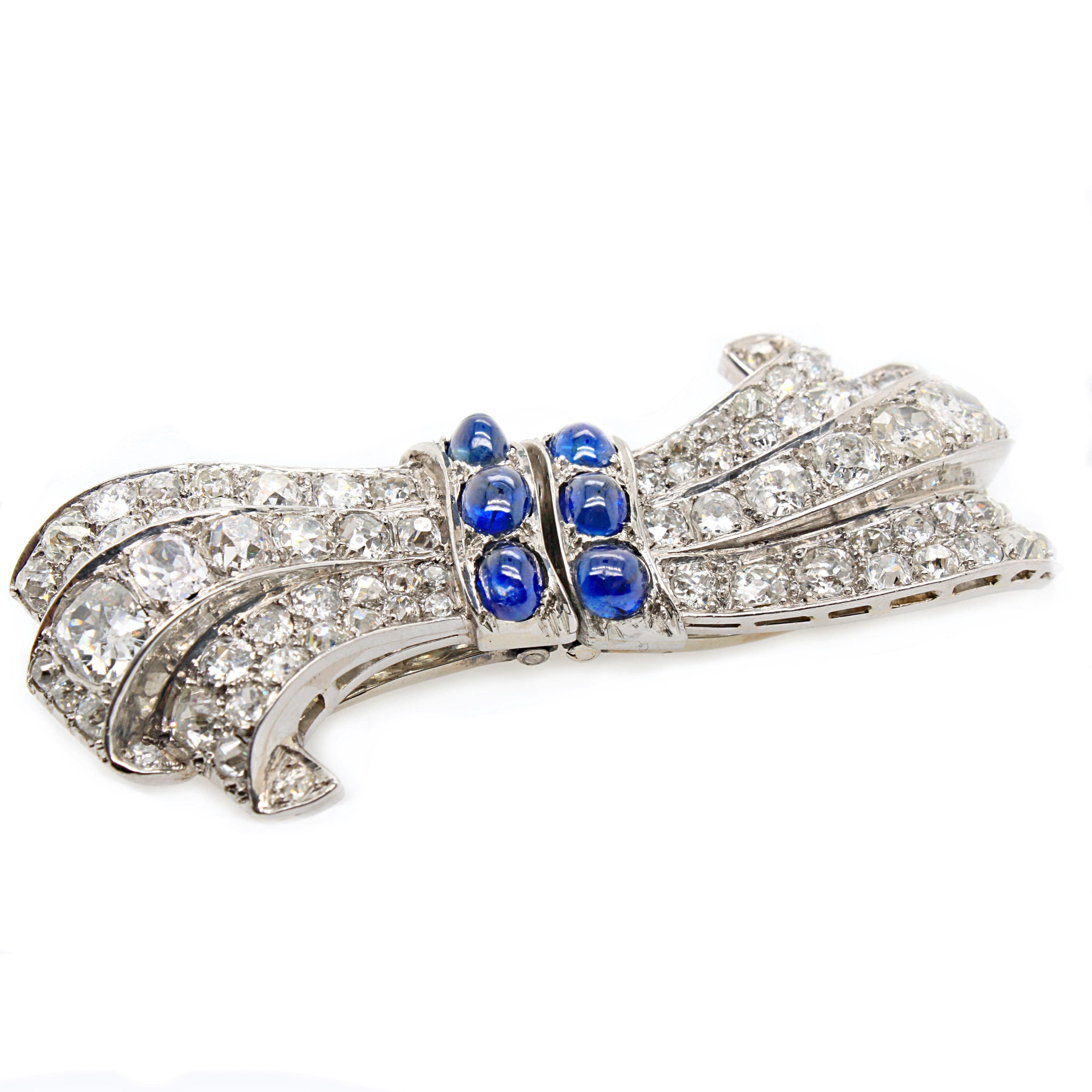 A lovely Victorian double clip bow brooch with diamonds and sapphires, ca. 1880s. 

The diamonds are old European and cushion cut diamonds, weighing approximately 10 carats in total. The diamonds are designed to follow the path of the bow brooch and