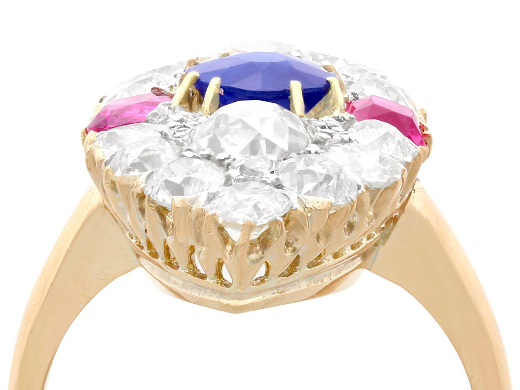 An impressive antique Victorian 4.34 carat diamond and 1.26 carat sapphire, 0.85 carat ruby and 17 karat yellow gold, silver set navette shaped ring; part of our diverse antique estate jewelry collections.

This stunning, fine and impressive