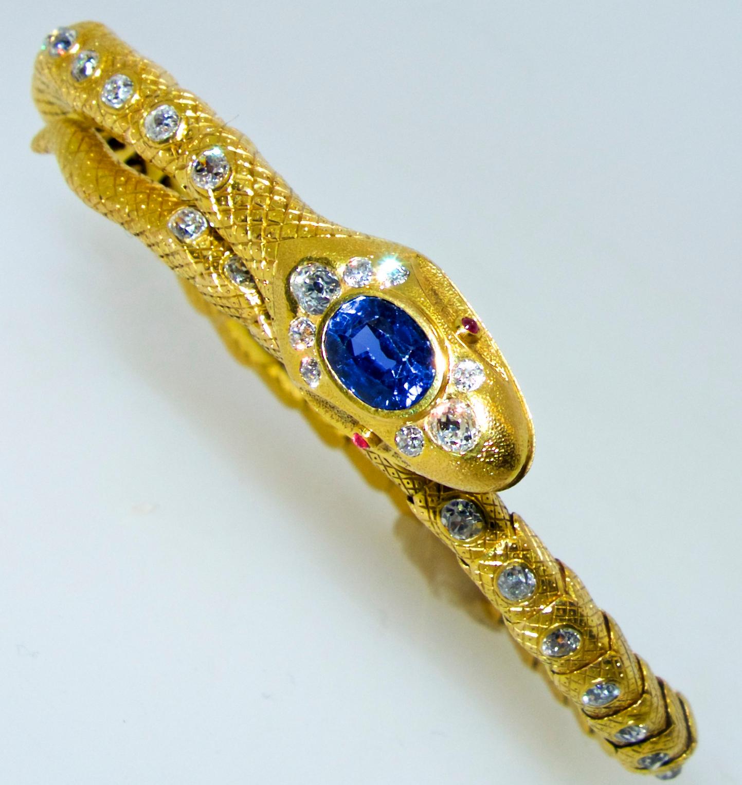 Antique Serpent  bracelet in 18K which will wrap around just about any wrist size.  The sapphire weighs approximately 2 cts. and is an natural unheated Ceylon stone.  There are 46 mine cut diamonds amounting to approximately 3.8 cts.  These old cut