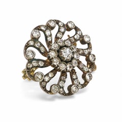 Victorian Diamond and Silver Upon Gold Pinwheel Cluster Brooch, Circa 1890