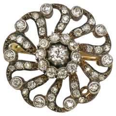 Victorian Diamond and Silver Upon Gold Pinwheel Cluster Brooch, Circa 1890