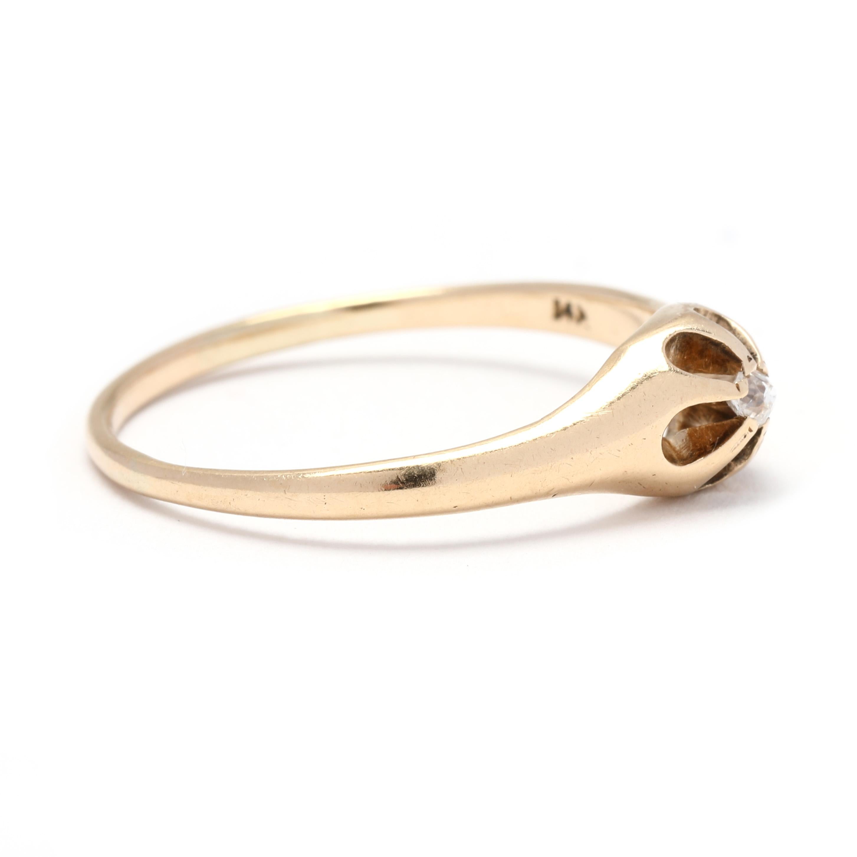 This beautiful Victorian diamond buttercup solitaire ring is a true vintage treasure. Crafted in 14k yellow gold, it features a stunning old european cut diamond in a unique buttercup setting. The diamond is approximately 0.04 carats in size. The