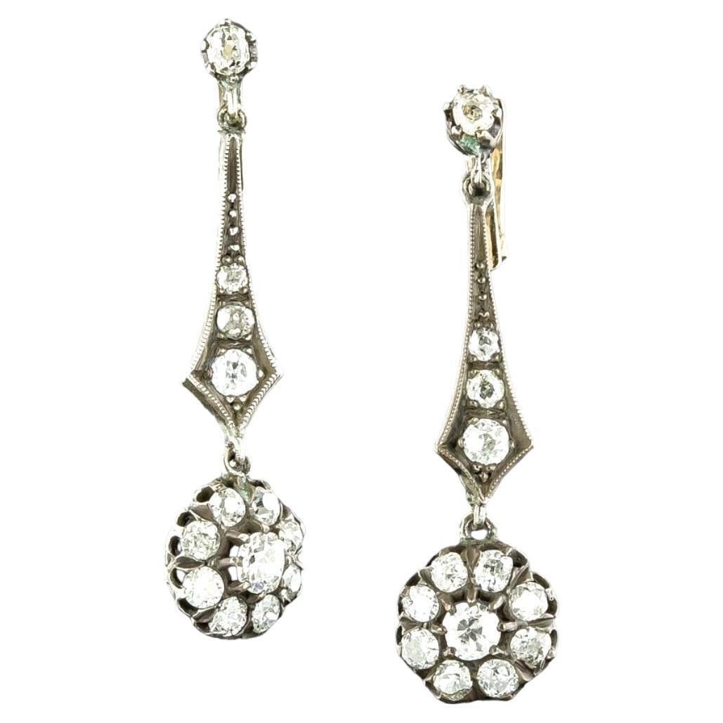 ANTIQUE ORIGINAL VICTORIAN DIAMOND DANGLE EARRINGS Late 19th Century.
Measuring 42mm (1.65 inches) long, lustrous and lovely, these classic antique  Victorian original ear drops, hand fabricated in silver over 18K gold in timeless 19th century,
