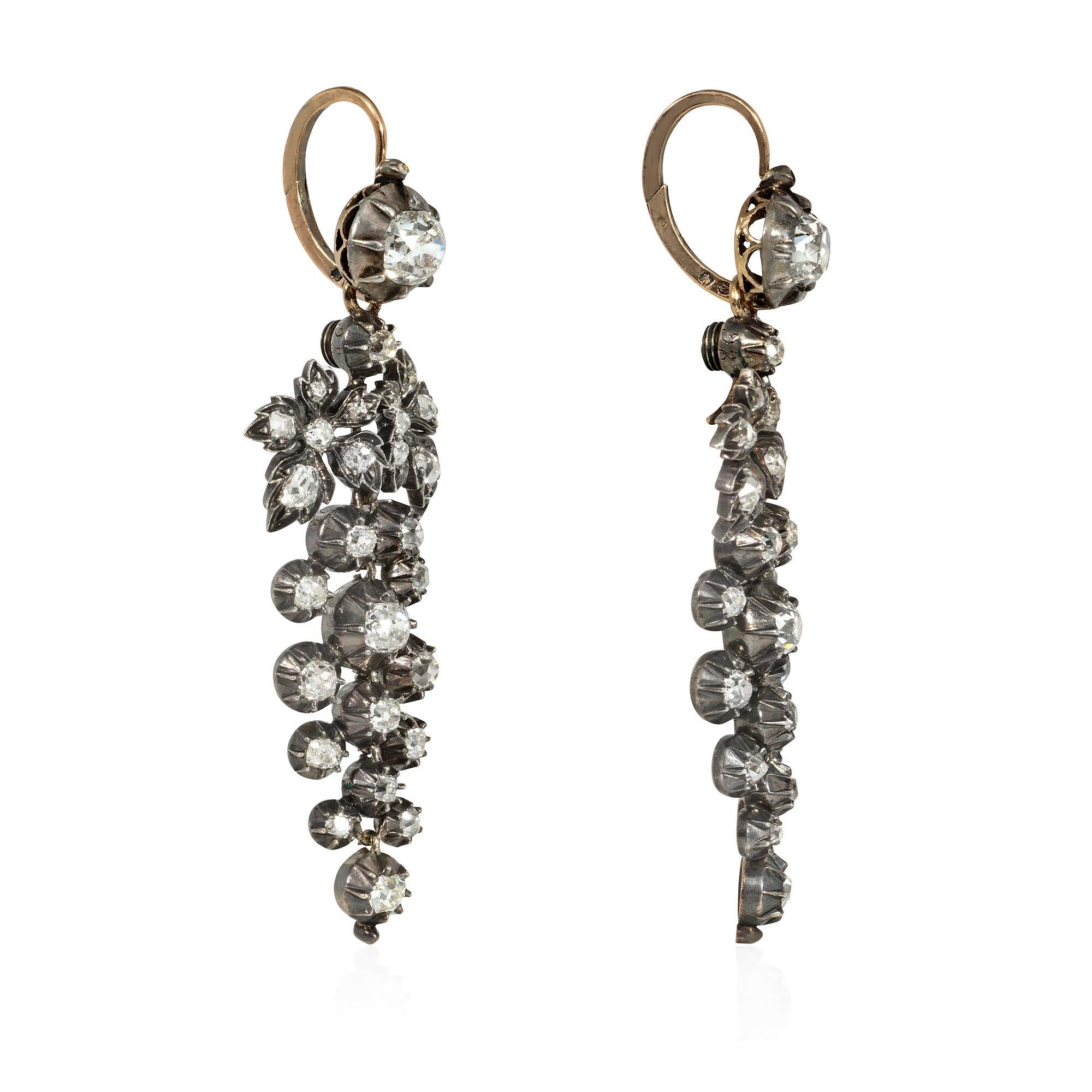 A pair of antique Victorian period day-to-night old mine cut diamond earrings with solitaire tops suspending removable articulated pendants designed as clusters of hanging grapes, in sterling silver and 18k gold.  Atw 5.00 cts. (tops approximately