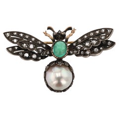Emerald Brooches