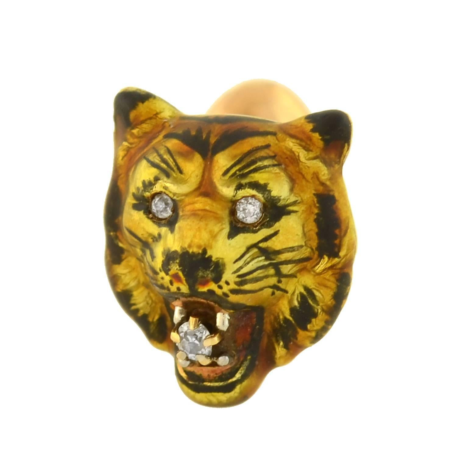 An exceptional pair of cufflinks from the Victorian (ca1880s) era! Crafted in 14kt yellow gold, each of these beautiful cufflinks depicts a single 3-dimensional tiger head detailed with colorful enameling and sparkling diamonds. The tigers have a