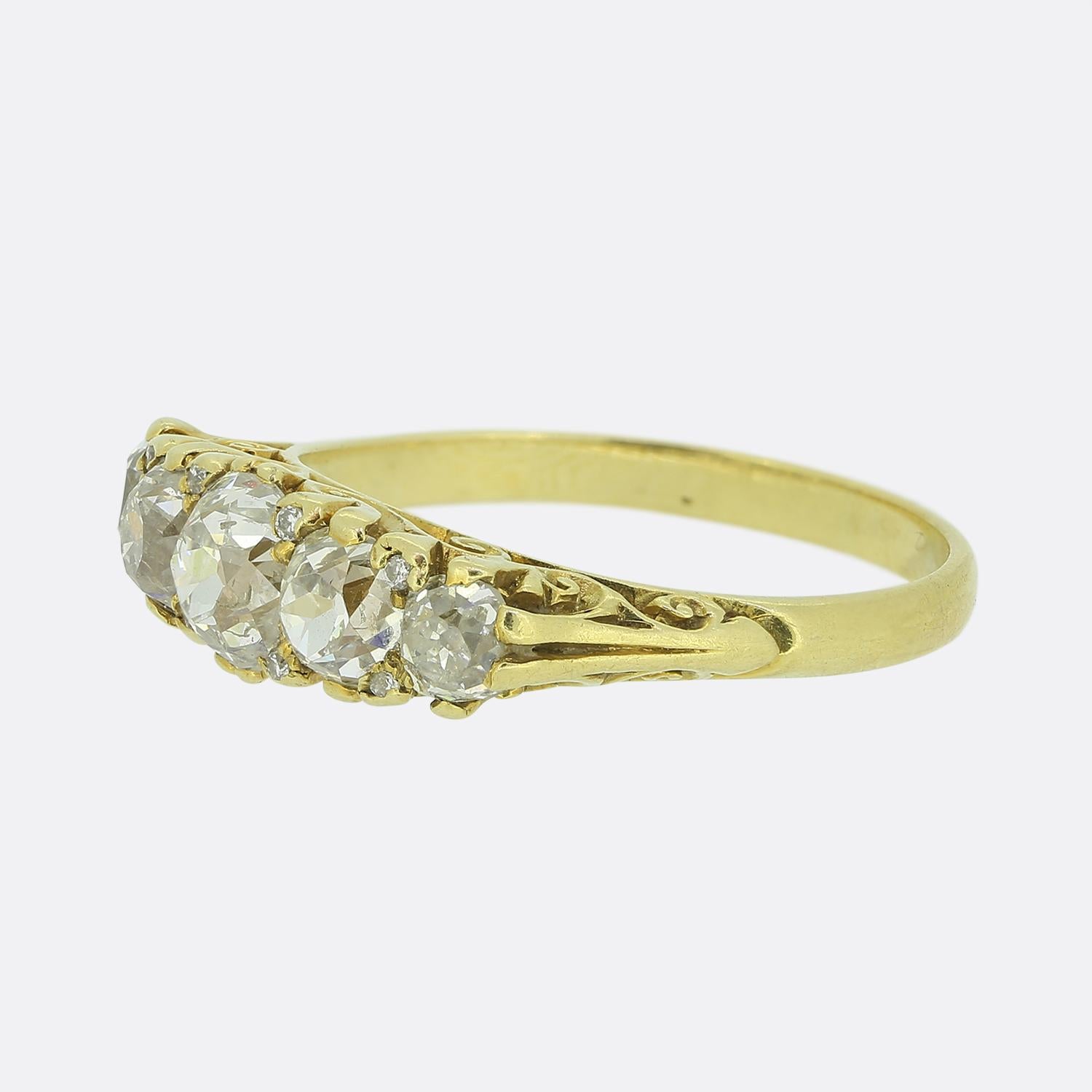 This is a wonderful 18ct yellow gold Victorian diamond five stone ring ring. The diamonds are bright white chunky old cuts and feature a stunning sparkle. They also graduate in size with the largest in the centre. The ring would have been