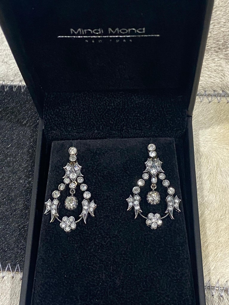 We love a good Victorian earring. These are the perfect size & comfortable.
Approx. 2.50 carat total weight of old cut diamonds set in silver topped in yellow hold. Center dangling diamonds are approx 0.40 each. True to the period Circa