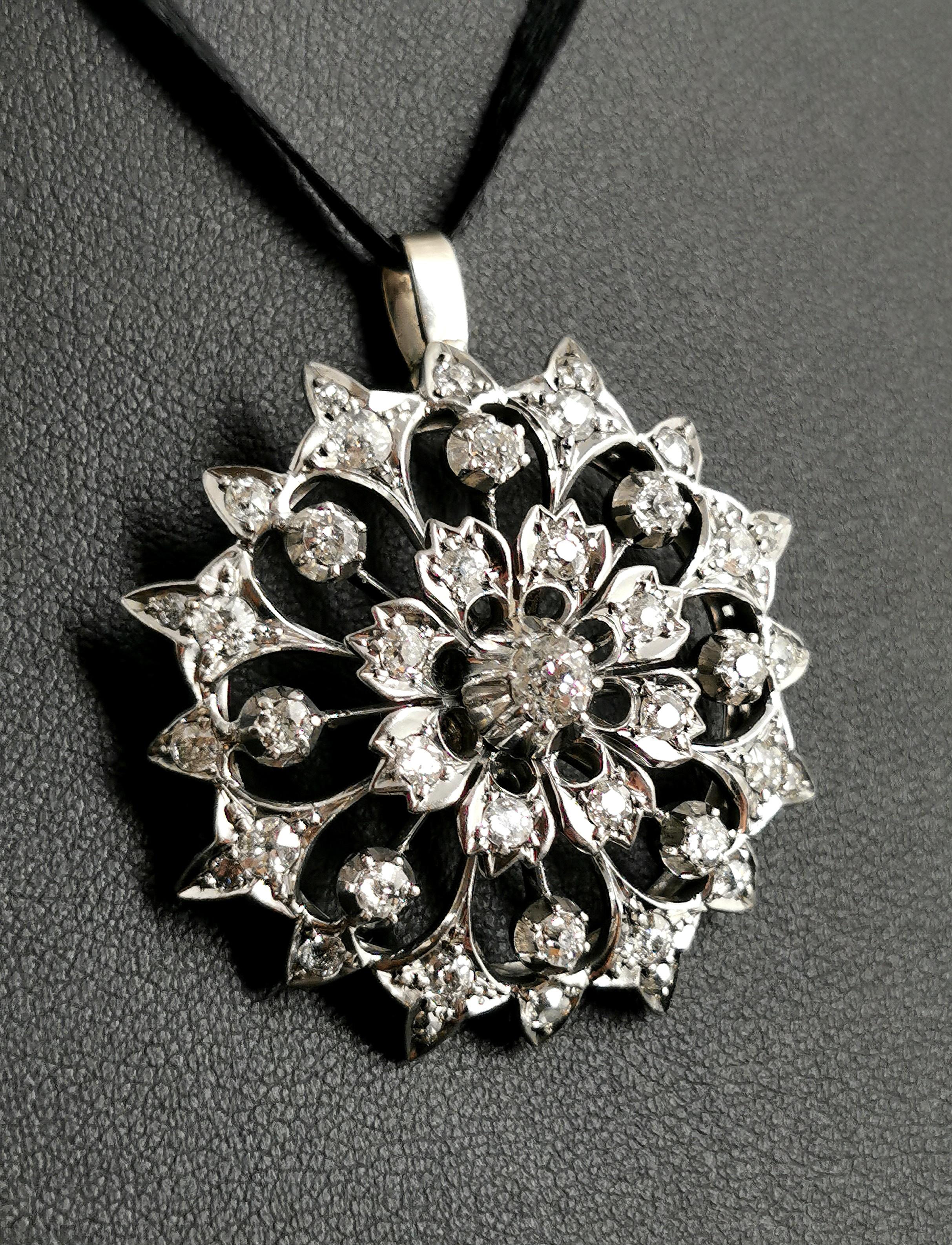 This absolutely stunning Victorian diamond pendant is truly a showstopper!

This beautifully master crafted piece is both elegant and statement at the same time, the pendant has a beautiful openwork floral design giving it a lovely feminine vibe and