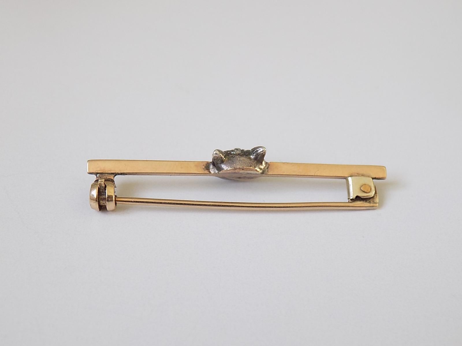 A Victorian c.1890 Rose cut Diamond Fox head bar brooch in Silver and 9 Carat Gold. English origin.
Width of the Fox head 7mm .
Total length of the brooch 38mm.
Unmarked.
The brooch in excellent condition for the age, fully complete with stones.