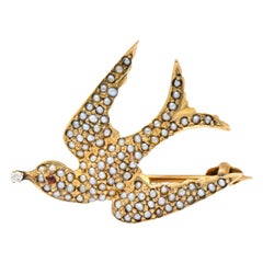 Victorian Diamond Garnet Seed Pearl Swallow Bird 14 Karat Gold Brooch