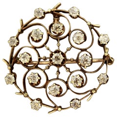 Broche circulaire victorienne en or et diamants