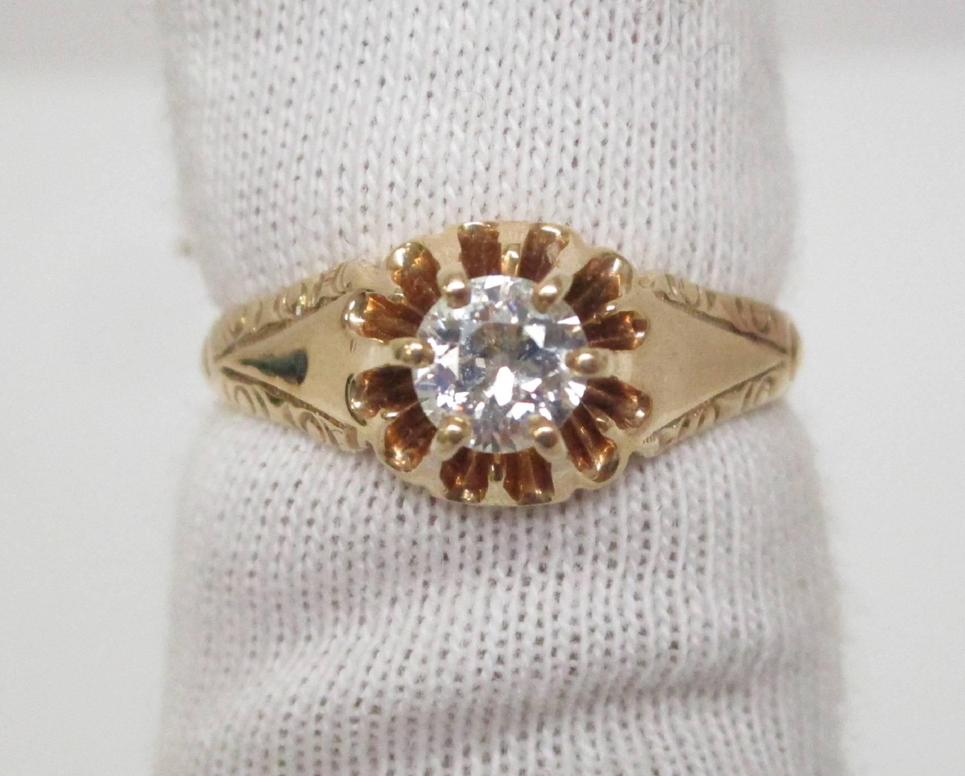 This Victorian-era engagement ring has a love language all its own. A striking diamond is in a warm embrace with a 14k yellow gold band. The twinkle of the diamond flirts with the shimmer of the gold and creates a dance of passion and lust. The