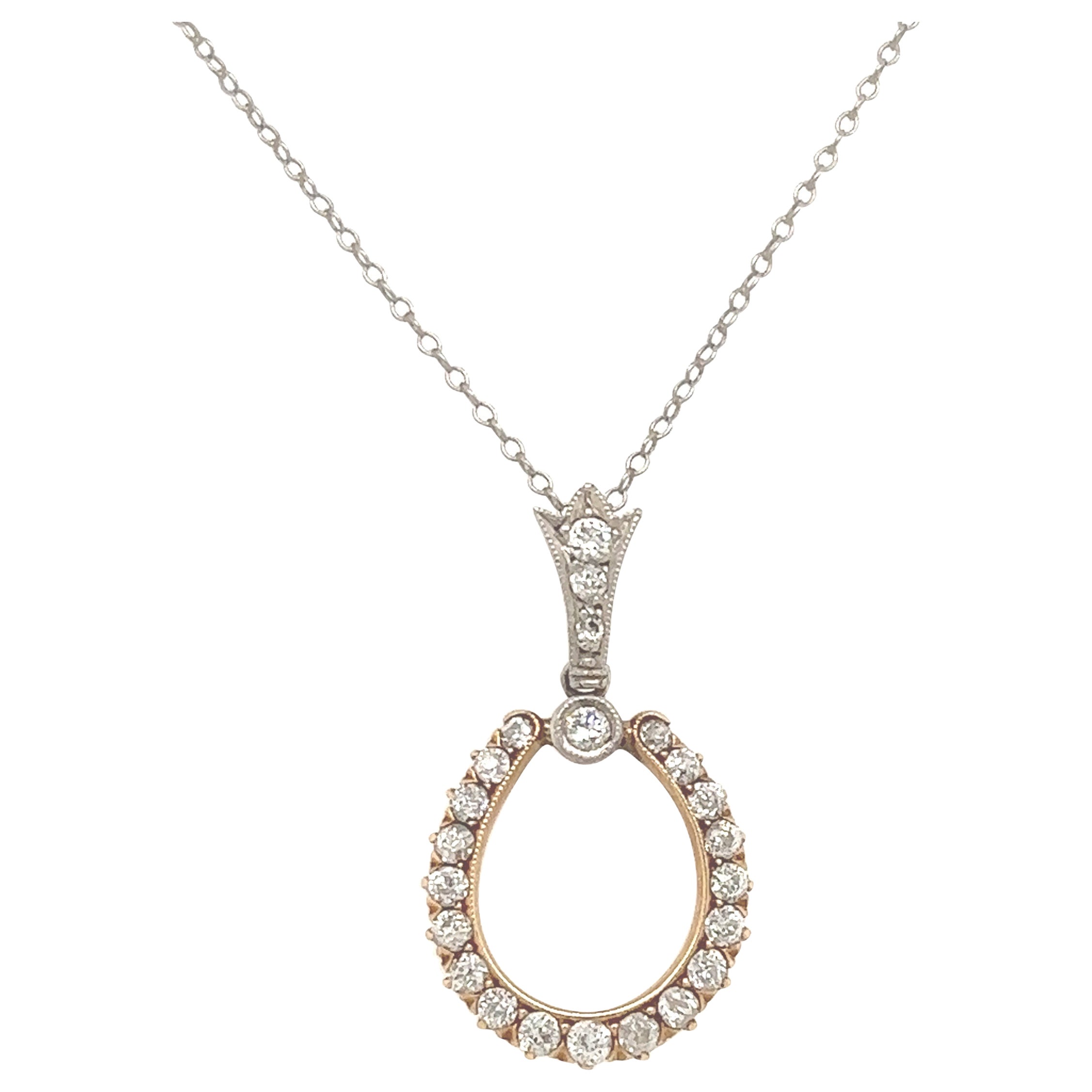 Collier pendentif fer à cheval victorien en platine et or jaune avec diamants