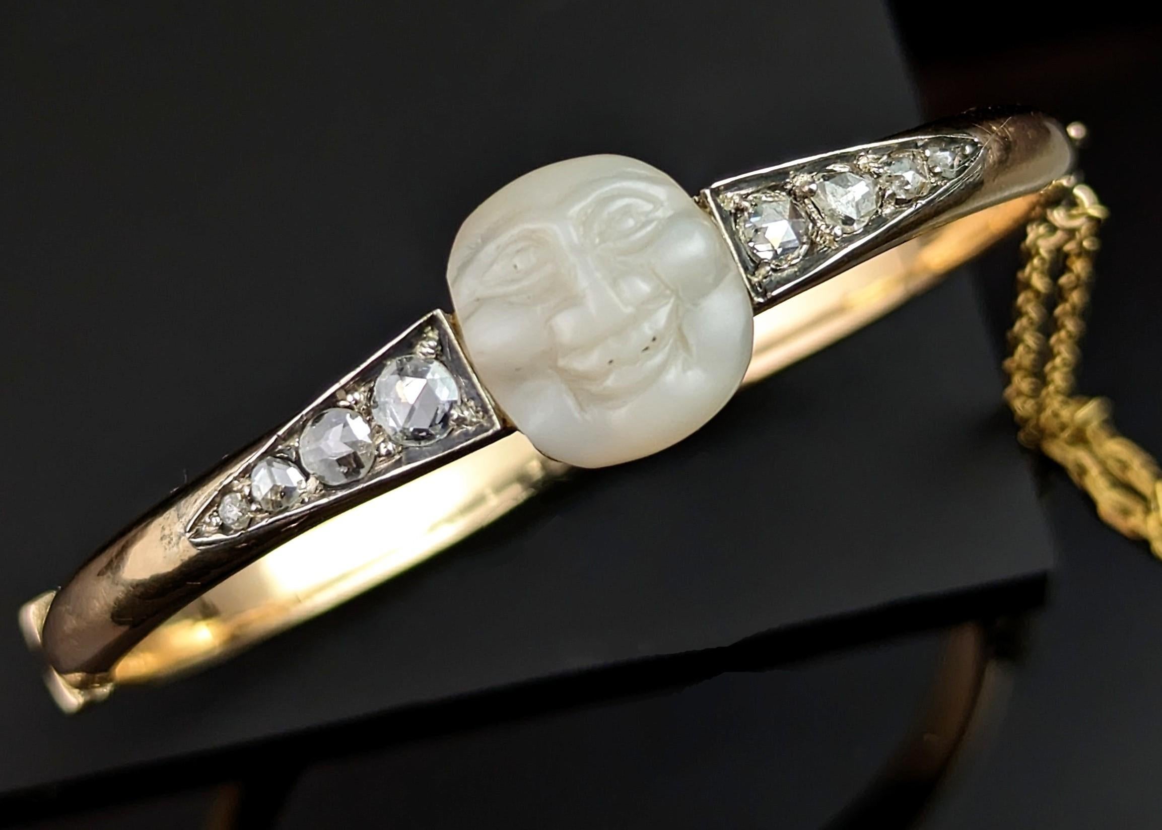 You cannot help but fall in love with this amazing piece! A very rare antique, Victorian era 'man in the moon' and diamond bangle.

Man in the moon jewellery was popular in the Victorian era and was most often seen in smaller pieces, rings, pendants
