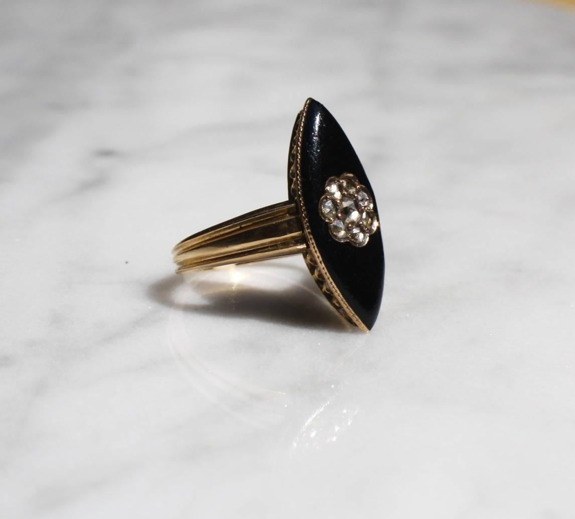 Gorgeous black enamel, rosecut diamonds totaling .70 ctw set in 18K solid yellow gold navette shaped mourning ring. Victorian era antique, late 1800s. Gold is unmarked but acid tested as solid 18K. The ring and lovely diamonds are in very good
