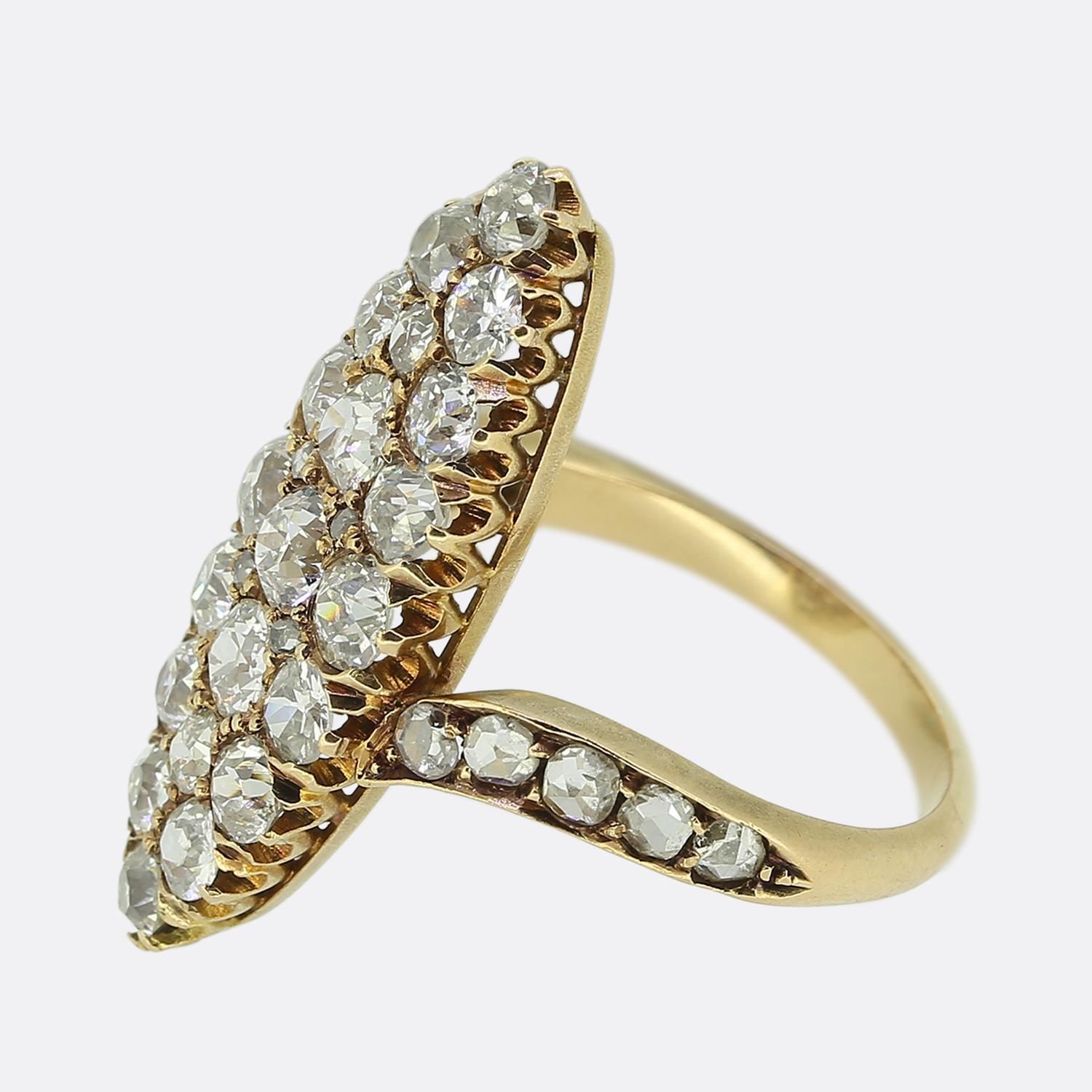 Here we have an outstanding diamond cobblestone ring originally dating back to the Victorian period. The face of this antique piece has been crafted from yellow gold into a boat-like shape which plays host to a vast array of bright white chunky old