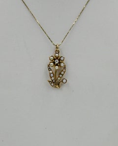 Collana vittoriana con diamante, perla e fiore in oro Belle Époque