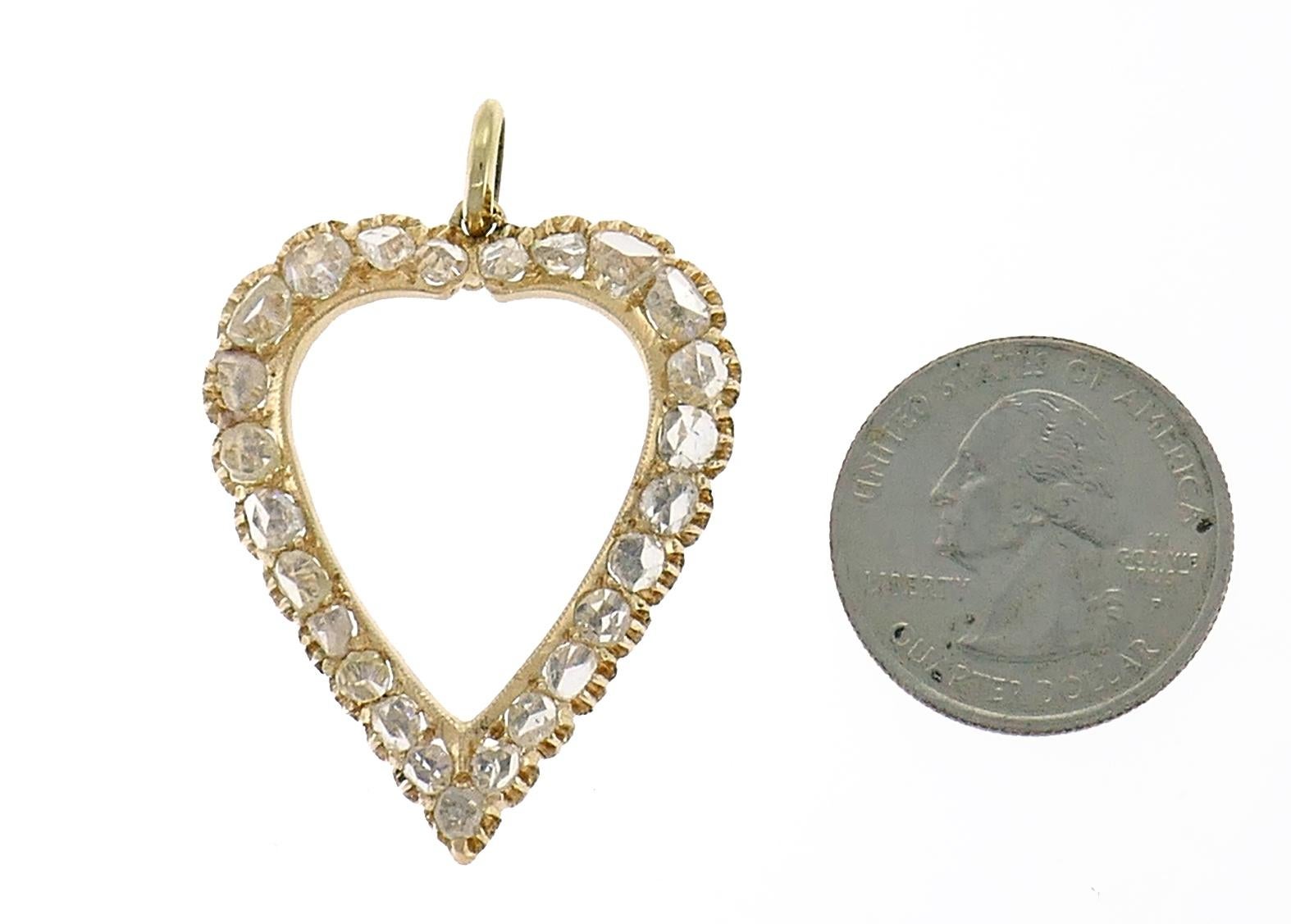 Lovely Victorian open heart pendant.
Made of 14 karat (tested) rose gold and set with twenty-five rose cut diamonds (H-I color, Si clarity, approximately 1.70 carats total weight).
Measurements: 1.5 x 1.25 inches (4 x 3.3 cm).
Weight: 6.5grams.
