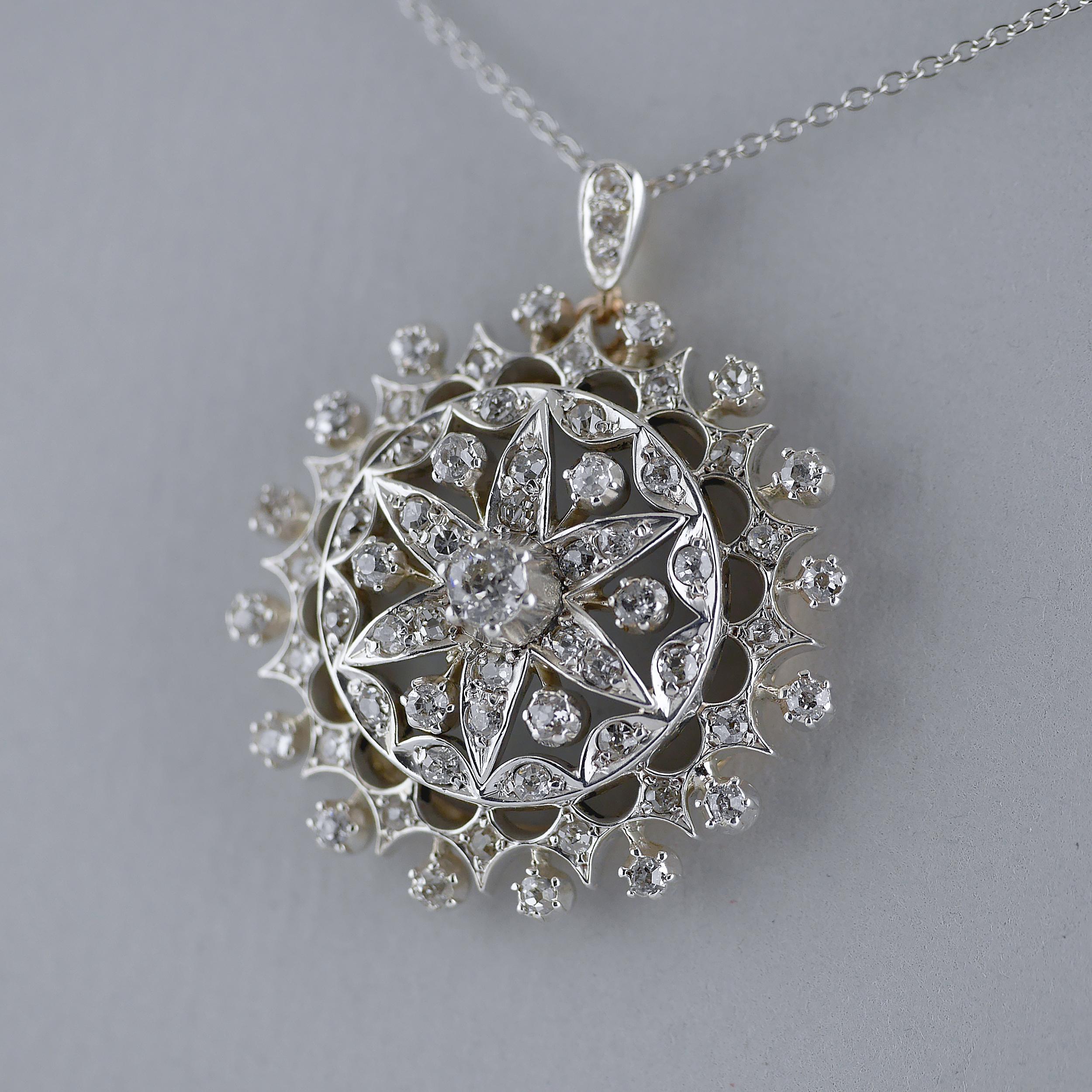 18ct gold and silver set late Victorian, Diamond round shaped Pendant circa 1880 

Floral and starburst motif design with round Victorian cut (old mine) diamonds, approx 5ct (Carats) in total. Mix of old mine and rose cut diamonds in an 18ct yellow