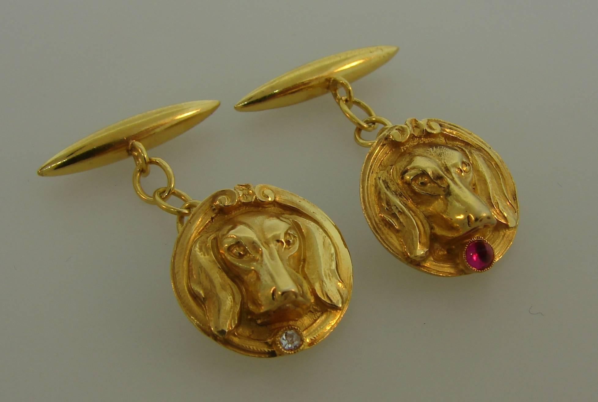 Cute and fun dachshund dog cufflinks. Elegant and wearable, the cufflinks are a great addition to your jewelry and accessories collection. 
Made of 18 karat (stamped) yellow gold and accented with old mine cut diamond and cabochon ruby.
The