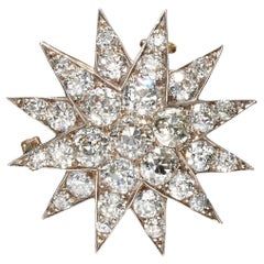Victorian Diamond, Silver and Gold Twelve Ray Star Brooch, 7.00 Carats