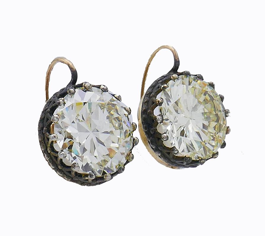 Fabulous Victorian diamond drop stud earrings. 
Made of 14 karat (stamped) yellow gold and silver, the earrings feature two Old European cut diamonds, one is approximately 8.84-carat P-Q color, VS1 clarity and 9.00-carat Q-R color SI2 clarity.
The